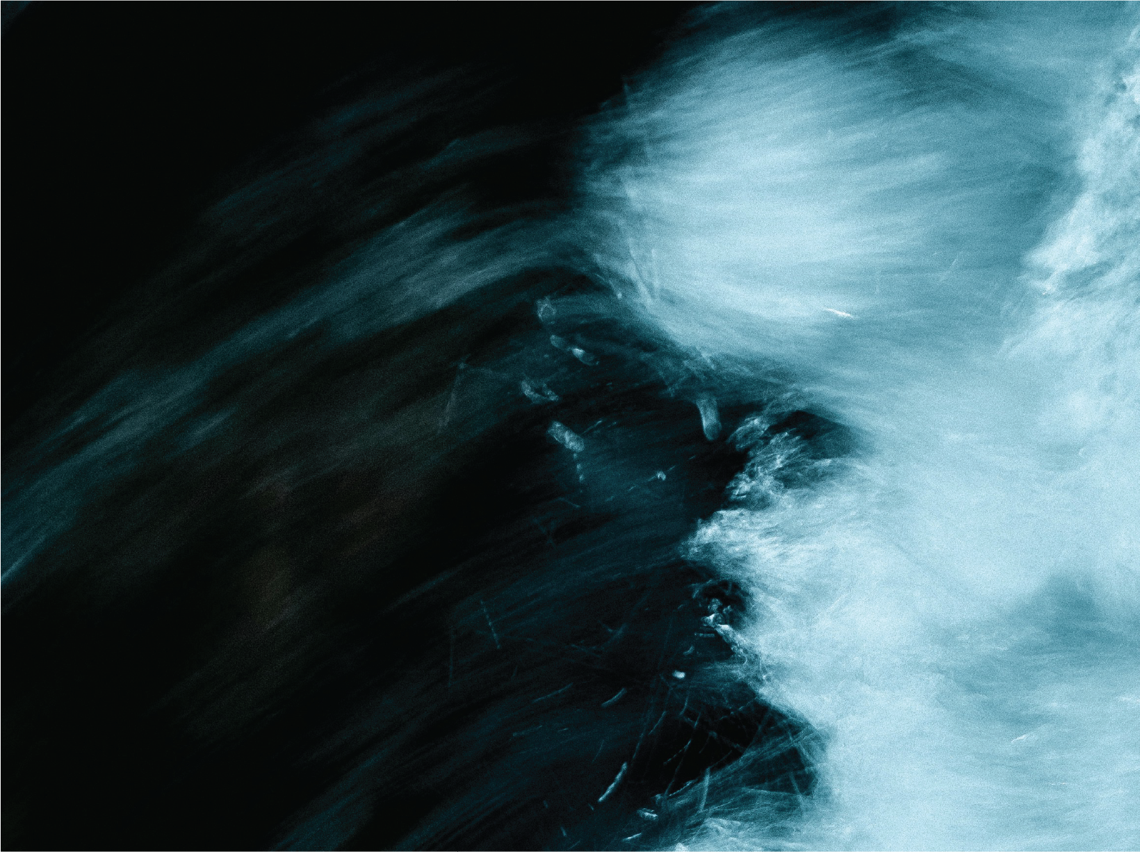 An abstract painting of a wave, in shades of black, blue, and white